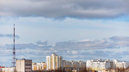 Panoramic view of new residential district with high-rise buildings and television antenna under blue sky with clouds of European visa-free city of Grodno or Hrodna Belarus with copy space.の写真素材