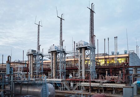 At modern chemical plant. Air cooling system with electric motors and synthesis columns of chemical production.の写真素材