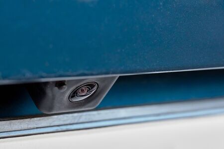 Luxury car rear view camera close up for parking assistance. Concept of safety car driving while parking process. Assist device equipment in modern cars.の写真素材