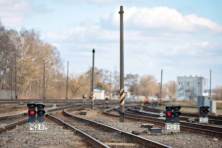 Large empty railroad fork semaphore. Concept of industrial logistic and transportation background with selected focus on lantern with copy space.の写真素材