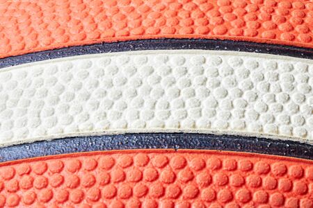 Basketball ball orange and white with black stripes skin closeup macro texture stacked photo for design background with copy spaceの写真素材