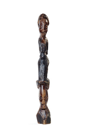 LUSAKA, ZAMBIA - NOVEMBER 2013: Typical examples of African art - African Figurine Over White Backgroundのeditorial素材