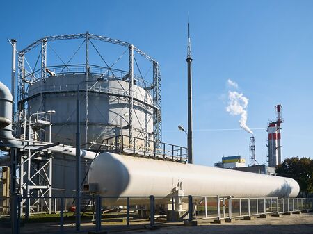 Huge horizontal liquid oxygen tank for the needs of medical institutions and hospitals and cylindrical oxygen gas-holder as example of chemical equipment example.の写真素材