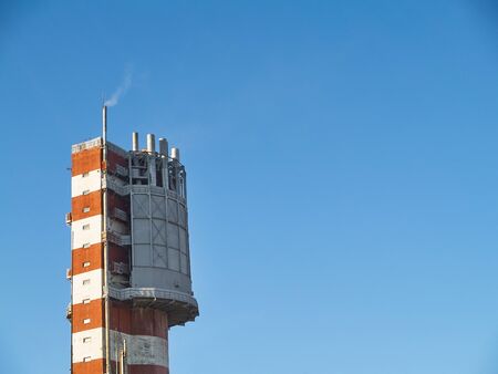 Example of tower granulator technology for production of new urea based compound fertilizer with smooth particles better strength granularity. Chemical plant over blue sky background with copyspaceの写真素材