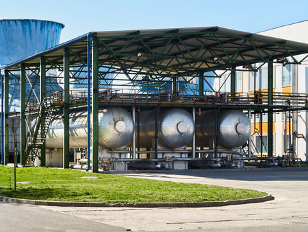 Production of liquefied carbon dioxide of carbonic acid part of chemical plant three cryogenic tanks with CO2 under canopy, that protects from solar heat with refueling and export filling deviceのeditorial素材