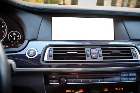Monitor in car isolated blank screen for navigation maps and GPS rearview camera and parking assistant. Isolated on white with clipping path Car display blank screen mock up copy space.の写真素材