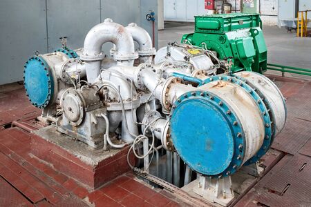 Business background of chemical enterprise high-pressure oxygen compressor for supplying workshops and departments of chemical plant with oxygen, for further petrochemical synthesis and reactions.の写真素材