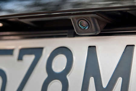 Luxury rear car rear view camera close up for parking assistance. Concept of safety car driving while parking process. Assist device equipment in modern carsの写真素材