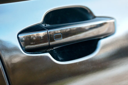 GRODNO, BELARUS - DECEMBER 2019: Audi A6 4G C7 facelift Luxury car door handle and sensor. Doors locked and unlocked without operating master key, closing door by touching sensor safety concept.のeditorial素材