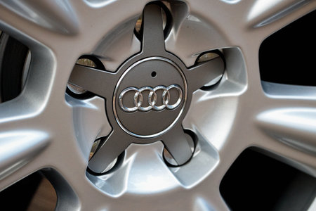 GRODNO, BELARUS - DECEMBER 2019: Audi A6 4G C7 Luxury car closeup alloy wheel part with titanium look matt finish.のeditorial素材