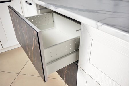 Kitchen Cabinet Door Drawer side view with Soft Quiet Closer Damper Buffers Cushion, solution to slow down closing action of cupboard, storage cabinet and drawer slamming reduce close noise protect.の写真素材