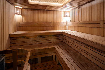 Russian sauna clean wooden bathhouse with stove and wooden lanterns hygrometer and thermometer. Bath and sauna are good means of preventing disorders of cardiovascular and respiratory systems.の写真素材