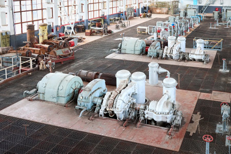 GRODNO, BELARUS - MAY 2020: Compression department machinery. Chemical industrial interior Example. Two high pressure nitrogen turbine compressors of nitrogen fire extinguishing system.のeditorial素材