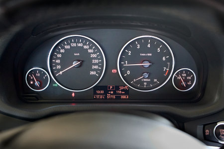GRODNO, BELARUS - JUNE 2020: BMW X3 II F25 2.0i xDrive Rev counter of car selective focus closeup with copyspace Tachometer or revolution counter, RPM gauge on car dashboard with fuel and speed meterのeditorial素材