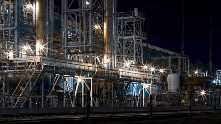 Night industrial petrochemical landscape. Methanol synthesis process mixed reforming reactors columns. Methanol production CO2 utilization by methanol reactor column for alternative to petroleum fuelsの写真素材