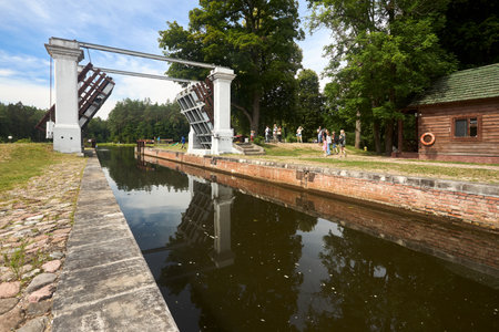 Grodno - August 2021: Augustow Canal, Avgustovski channel or Kanal Augustowski uniting Vistula Neman rivers protected by UNESCO in Dombrovka Chertok Grodno Hrodna visafree region Belarus in Europe.のeditorial素材