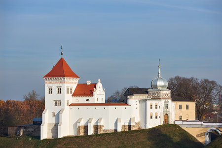 Grodno, Belarus - October 2021: Grodno Old castle on the Castle Hill, an ancient oldest royal Castle of Belarus and church, historical monument. Building exterior in autumn Eastern European visa free city Grodno, or Hrodna Belarus.のeditorial素材