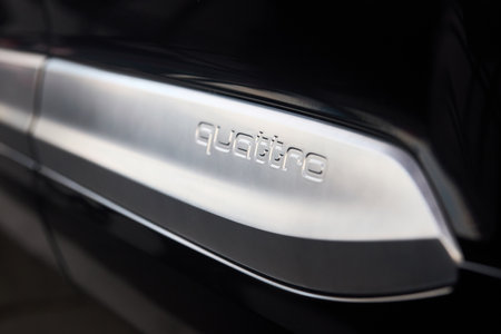 Berlin - August 2022: Audi Q7 S-line Q7 S line Second generstion SUV side shot QUATTRO logo badge emblem closeup.のeditorial素材