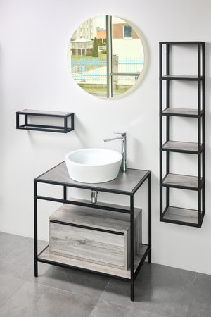 Stoneware countertop bathroom with tired beton wall stoneware tiled floor. Gray industrial flat loft bathroom with modern countertop basin, round mirror and wooden cupboard.の写真素材