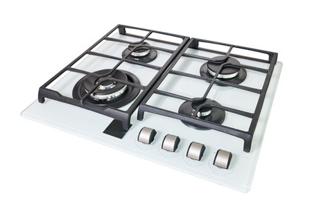 Modern hob gas stove made of tempered white glass using natural gas or propane for cooking products, isolated on white background.の写真素材
