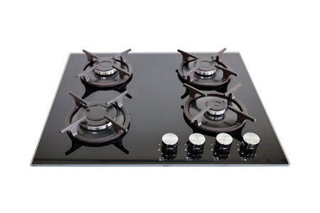 Modern built-in gas stove classic design in dark tones, isolated on white background.の写真素材