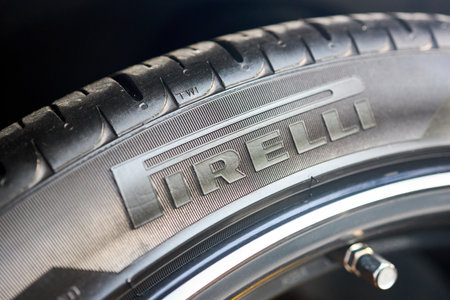 Berlin, Germany - August 20: Pirelli logo badge emblem on tire alloy wheel selective focus closeup.のeditorial素材