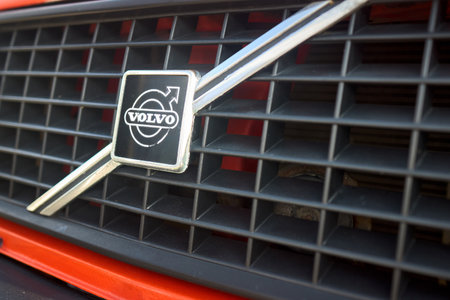 Berlin, Germany - August 20, 2022: Front view of old 80s Volvo badge logo emblem with radiator grill selective focus closeupのeditorial素材
