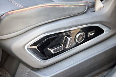 Car detail seat adjustment control panel close up view. Adjustable car seat position. Car interior.の写真素材