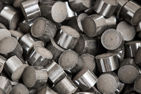 Zinc oxide chromium copper catalyst cylinder pellet form shape methanol synthesis industrial petrochemical background, selected focus close up macro shot.の写真素材