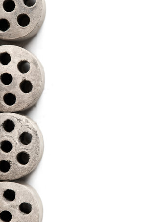 Carbon dioxide reforming of methane nickel catalyst seven holes cylinder pellet form shape methanol synthesis industrial petrochemical background, selected focus close up vertical shot with copyspace.の写真素材