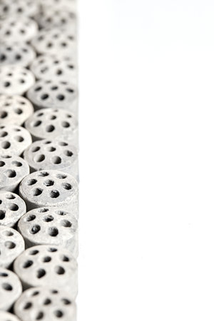 Carbon dioxide reforming of methane nickel catalyst seven holes cylinder pellet form shape methanol synthesis industrial petrochemical background, selected focus close up vertical shot with copyspace.の写真素材
