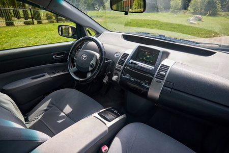 Berlin, Germany - May, 3 2024: Toyota Prius XW20 2009 hybrid electric car interior design with steering wheel dashboard gearbox and multimedia systemのeditorial素材