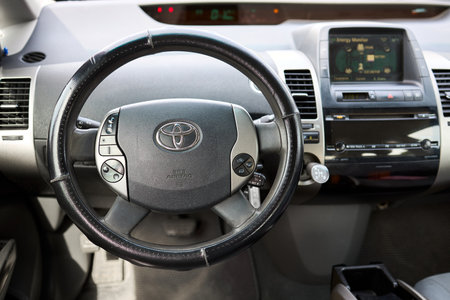 Berlin, Germany - May, 3 2024: Toyota Prius XW20 2009 hybrid electric car interior design with steering wheel dashboard air bag and multimedia systemのeditorial素材
