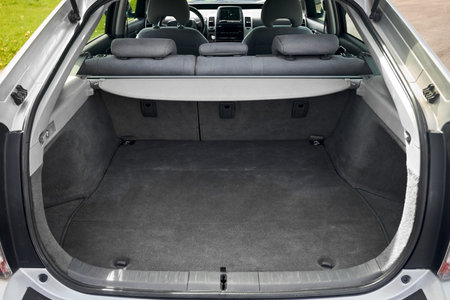Berlin, Germany - May, 3 2024: Toyota Prius XW20 2009 hybrid electric car hatchback trunk with cover curtain or cargo cover rear seats, and luggage empty space.のeditorial素材