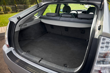 Berlin, Germany - May, 3 2024: Toyota Prius XW20 2009 hybrid electric car hatchback trunk with cover curtain or cargo cover rear seats, and luggage empty space.のeditorial素材