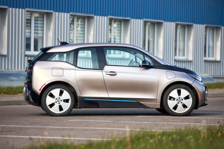 Berlin, Germany - May, 4 2024: BMW i3 Range Extender REx 2015 electric B class high roof hatchback selective focus over out of focus urban background.のeditorial素材