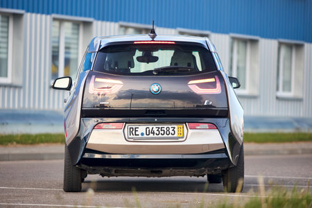 Berlin, Germany - May, 4 2024: BMW i3 Range Extender REx 2015 electric B class high roof hatchback selective focus over out of focus urban background rear back side view.のeditorial素材
