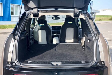 Berlin, Germany - May, 4 2024: BMW i3 Range Extender REx 2015 electric B class high roof hatchback interior ready to load luggage. Clean trunk wagon car. Modern car open trunk.のeditorial素材