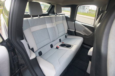Berlin, Germany - May, 4 2024: BMW i3 Range Extender REx 2015 electric B class high roof hatchback interior. Clean car interior with grey back passengers seats.のeditorial素材