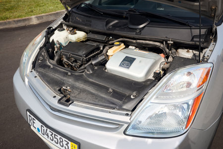 Berlin, Germany - May, 3 2024: Toyota Prius XW20 2009 hybrid electric car engine bay with hybrid synergy drive engine with headlights side view.のeditorial素材