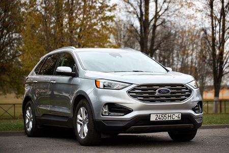 Minsk, Belarus - October, 22 2024: Ford Edge II 2nd generation crossover SUV manufactured Ford Motor Company 2015 to 2024 mid size CUV. Front Left three quarters selective focus shot.のeditorial素材