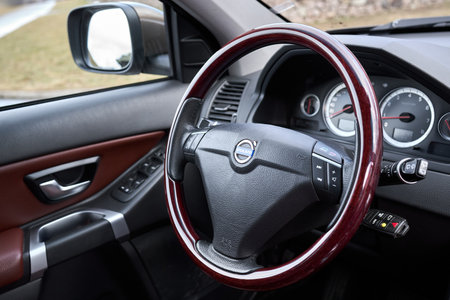 Berlin - October 2021:: Volvo XC90 2.5 1st generation Twilight Bronze 2002-20014 restyling 4WD 4wheel 4x4 SUV brown leather car interior, dashboard and wooden steering wheel with heating function.のeditorial素材