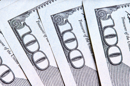New US Dollar USD 2009 series bill bundles background for design. Many bundle of US 100 dollars bank...