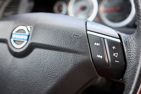 Berlin, Germany - February, 2 2021: Volvo XC90 2.5 1st generation Twilight Bronze 2002-2014 restyling 4WD 4wheel 4x4 SUV steering wheel with multimedia and phone control buttons.のeditorial素材