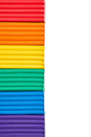 Artistic plastic clay for modeling rainbow-themed as rainbow flag or pride flag, formerly gay pride flag, symbol of LGBTQ pride and LGBTQ social movements. Plasticine for learning craft close up.の写真素材