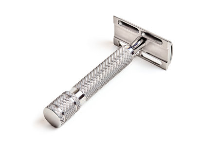 Safety Bar DE Double-Edge Razor with closed comb machined with CNC from marine grade billet stainless steel isolated on white focus stacking shot. Classic Wet Shaving Supplies and Accessories.の写真素材