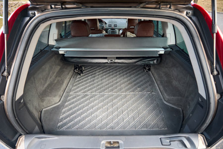 Berlin, Germany - February, 2 2021: Volvo XC90 2.5 1st generation Twilight Bronze 2002-2014 restyling 4WD 4wheel 4x4 SUV interior. Opened empty clean trunk.の写真素材
