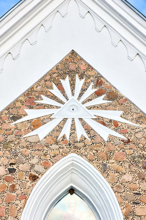 Gozha Belarus - All Seeing Eye symbol as detail of Catholic Church of St. Peter and St Paul decoration in Gozha Hoza near Grodno Belarus. Masonic Triangle and eye Illuminati symbolの写真素材