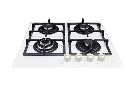 Modern hob gas stove made of tempered white glass using natural gas or propane for cooking products, isolated on white background.の写真素材