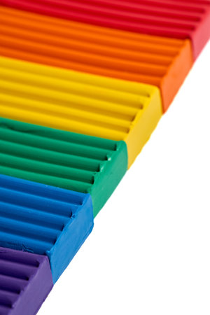 Artistic plastic clay for modeling rainbow-themed as rainbow flag or pride flag, formerly gay pride flag, symbol of LGBTQ pride and LGBTQ social movements. Plasticine for learning craft close up.の写真素材